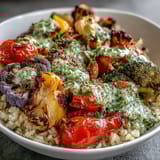 This nourishing Rainbow Roasted Vegetable Bowl is a vegetarian and gluten-free main dish ready in under an hour.  